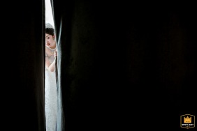   At the ceremony venue in Shandong, a bride patiently awaits her moment, anticipation and hope shining as she stands ready to join her partner.